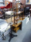 A SMALL OAK THREE TIER OPEN BOOKCASE; A GREY SQUARE COFFEE TABLE AND A TORCHERE ON HEAVY BLACK METAL