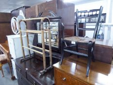 A CHILD?S 19TH CENTURY EBONISED SINGLE CHAIR, WITH RUSH SEAT AND A PINE TOWEL HORSE (2)