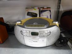 A PHILIPS RADIO/CD PLAYER AND TWO HAIRDRYERS