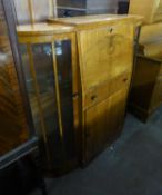 A WALNUTWOOD SIDE BY SIDE BUREAU DISPLAY CABINET, THE CENTRAL SECTION HAVING DROP-FRONT OVER A