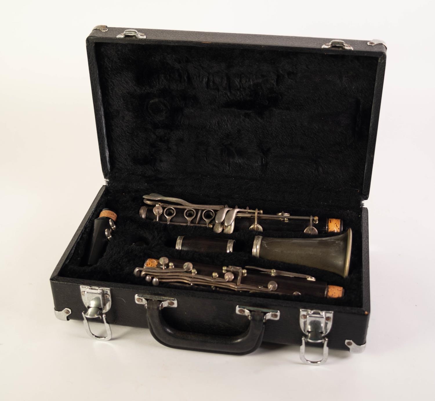 MID TWENTIETH CENTURY HARDWOOD AND MOULDED COMPOSITION UNBRANDED FIVE PIECE CLARINET, with plated