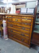 EDWARDIAN SATIN WALNUT CHEST OF EIGHT DRAWERS, THE UPPER SECTION WITH CENTRE DEEP DRAWER FLANKED