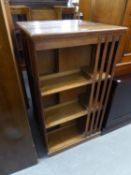 A PAIR OF OAK THREE TIER OPEN BOOKCASES, WITH SLATTED SIDES, 1?9? WIDE, 3?3? HIGH