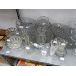 QUANTITY OF GLASSWARES TO INCLUDE; A CUT GLASS FRUIT BOWL, RAISED ON 3 SCROLL FEET (A.F.) OTHER