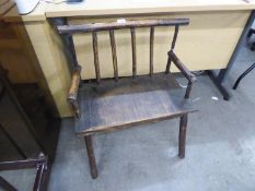 A STYLISH RUSTIC CHILD'S CHAIR/BENCH, RAISED ON FOUR TURNED SUPPORTS