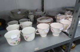 TUSCAN 1930'S CHINA TEA SERVICE AND A CZECH CHINA TEA SERVICE, BOTH FLORAL DECORATED