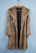 LADY'S PASTEL MINK HAT and a LADY'S MUSQUASH LIGHT BROWN FULL-LENGTH COAT (2)