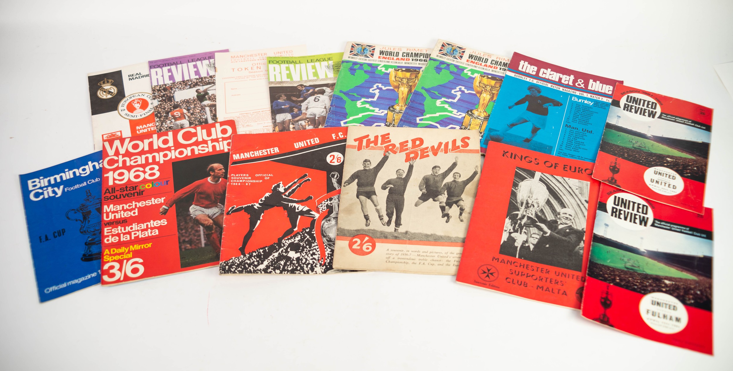 QUANTITY OF MANCHESTER UNITED PROGRAMMES FROM THE MID 1960s and United Will Go On, in mainly fair to