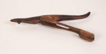 A GOOD AUSTRALIAN ABORIGINAL KANGAROO FORM WOODEN SPEAR/DART THROWER, 11" (28cm) long (incomplete)