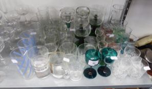 A SET OF SIX COLOURED STYLISH TUMBLERS, A PAIR OF SMALL GREEN STEM GLASSES, OTHER COLOURED STEM