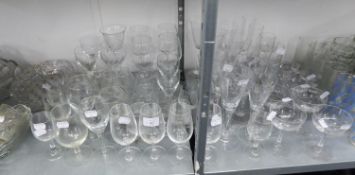 A SELECTION OF STEM CHAMPAGNE GLASSES AND BOWLS, ALSO A LARGE COLLECTION OF PLAIN STEM WINE GLASSES