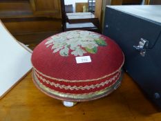 VICTORIAN CIRCULAR FOOTSTOOL, COVERED IN CRIMSON AND FLORAL WOOLWORK TAPESTRY