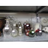 THREE VARIOUS ANTIQUE GLASS DECANTERS AND  A FOUR PIECE CONDIMENT SET ON PLATED STAND ETC...