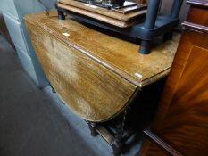 A PRE-WAR OAK OVAL GATE LEG DINING TABLE, ON SPIRALLY TWISTED SUPPORTS, 5? X 3?6?