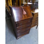 A SMALL REPRODUCTION MAHOGANY LADIES BUREAU, HAVING FOUR DRAWERS OVER DROP-FRONT