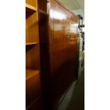 A LARGE MAHOGANY TWO DOOR SEMI-FITTED GENTS WARDROBE
