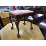 A LARGE OBLONG VICTORIAN STYLE STOOL, RAISED ON LONG CABRIOLE LEGS WITH CLAW AND BALL FEET