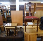 A NEST OF THREE OAK COFFEE TABLES, ON TRESTLE END SUPPORTS WITH SLEDGE FEET AND A BEDROOM CHAIR (2)