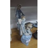 THREE NAO PORCELAIN FIGURES OF YOUNG GIRLS, one modelled in a bonnet, 12 ¼? high, another carrying