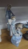 THREE NAO PORCELAIN FIGURES OF YOUNG GIRLS, one modelled in a bonnet, 12 ¼? high, another carrying