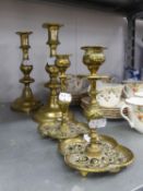 A PAIR OF BALUSTER TABLE CANDLESTICKS, ON DOMED CIRCULAR BASES AND A SMALL PAIR OF CAST BRASS