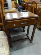 A SMALL 1930S OAK HALL OR TELEPHONE TABLE WITH ONE LONG DRAWER WITH STEEL BAR HANDLE, ON FOUR