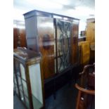 GOOD QUALITY MAHOGANY DISPLAY CABINET, HAVING GLAZED CENTRAL DOOR, FLANKED BY TWO DOORS, WITH OVAL
