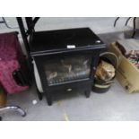 A SMALL DIMPLEX STOVE/FIRE AND A METAL LOG BASKET AND A MODERN GREY PAINTED CIRCULAR MIRROR (3)