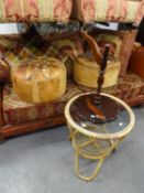 A PAIR OF MIDDLE EASTERN STITCHED LEATHER CIRCULAR POUFFES; A BAMBOO CIRCULAR OCCASIONAL TABLE