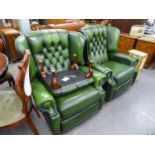 A PAIR OF GREEN LEATHER UPHOLSTERED ADJUSTABLE WING-BACK ARMCHAIRS, AND AN ASSOCIATED BUTTONED GREEN