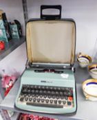 A CASED OLIVETTI LETTERA 32 TYPEWRITER