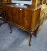 QUEEN ANNE STYLE LOW COCKTAIL CABINET WITH SEMI-FITTED INTERIOR, RAISED ON CABRIOLE LEGS (lacks