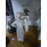 TWO LLADRO PORCELAIN OF YOUNG GIRLS IN NIGHT DRESSES, one modelled with a small guitar, a/f, 8 ¼?