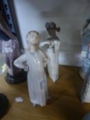 TWO LLADRO PORCELAIN OF YOUNG GIRLS IN NIGHT DRESSES, one modelled with a small guitar, a/f, 8 ¼?