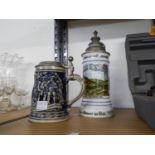 TWO GERMAN POTTERY BEER STEINS, WITH PEWTER LIDS, TO INCLUDE; A GRENZHOUSEN AND GEBZIT ? BLUE STEIN