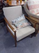A HARD WOOD FRAMED SMALL EASY ARMCHAIR, WITH UPHOLSTERED BACK AND SEAT