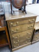 AN ELM CHEST OF FIVE LONG DRAWERS, THE FIVE DIAPER DRAWERS FITTED FOR CD STORAGE, BRASS DROP