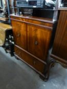 REPRODUCTION MAHOGANY TELEVISION CABINET, HAVING TWO DOORS WITH DROP FRONT SECTION BELOW