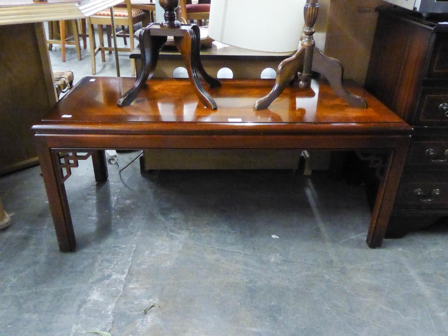 CHINESE MAHOGANY OBLONG COFFEE TABLE, ON FOUR STRAIGHT LEGS WITH FRET PIERCED BRACKETS, 3?6? X 1?8?