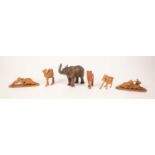 TWO PRE-WAR INDIAN INTRICATELY CARVED HARD WOOD SMALL GROUPS of a tiger attacking an elephant and