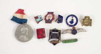 AN ENAMELLED GILT METAL ?RAF? WINGS BROOCH; A TINY ENAMELLED ROYAL AIR FORCE FLAG BADGE; ?Girl