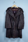 LUSTROUS DARK BROWN MINK FULL-LENGTH COAT with shawl collar, double breasted front with single