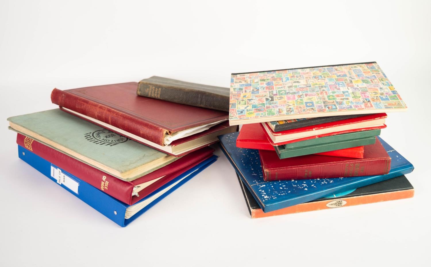 TWO CARRIER BAGS CONTAINING SIXTEEN VARIOUS ALBUMS, binders and stock books with an ALL WORLD