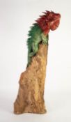 ORIENTAL CARVED AND COLD PAINTED ROOT MODEL OF A KOMODO DRAGON, perched on top of a tree stump, 29in