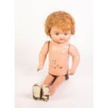 UNUSUAL PROBABLY ORE-WAR FLESH COLOURED TINPLATE AND MOULDED COMPOSITION TALL DOLL, the tinplate