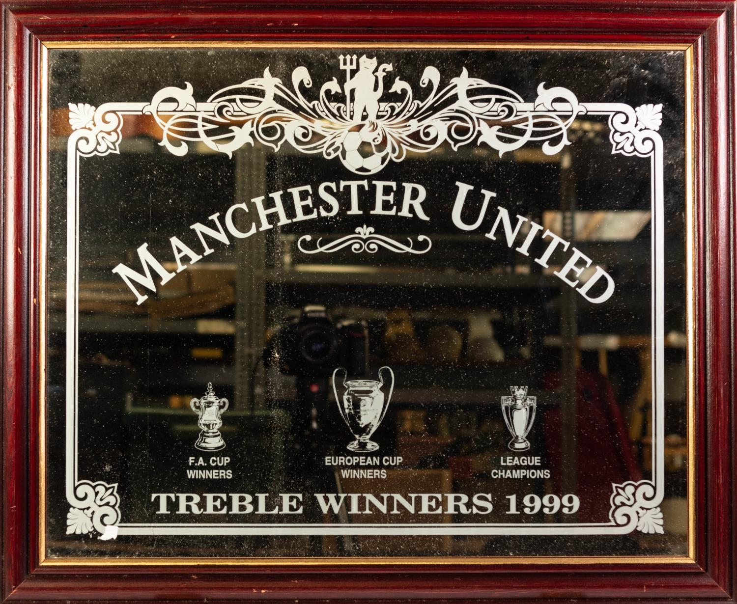 FIVE FRAMED PHOTOGRAPHIC PRINTS RELATING TO MANCHESTER UNITED including; 'King Eric' and a WALL