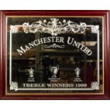 FIVE FRAMED PHOTOGRAPHIC PRINTS RELATING TO MANCHESTER UNITED including; 'King Eric' and a WALL
