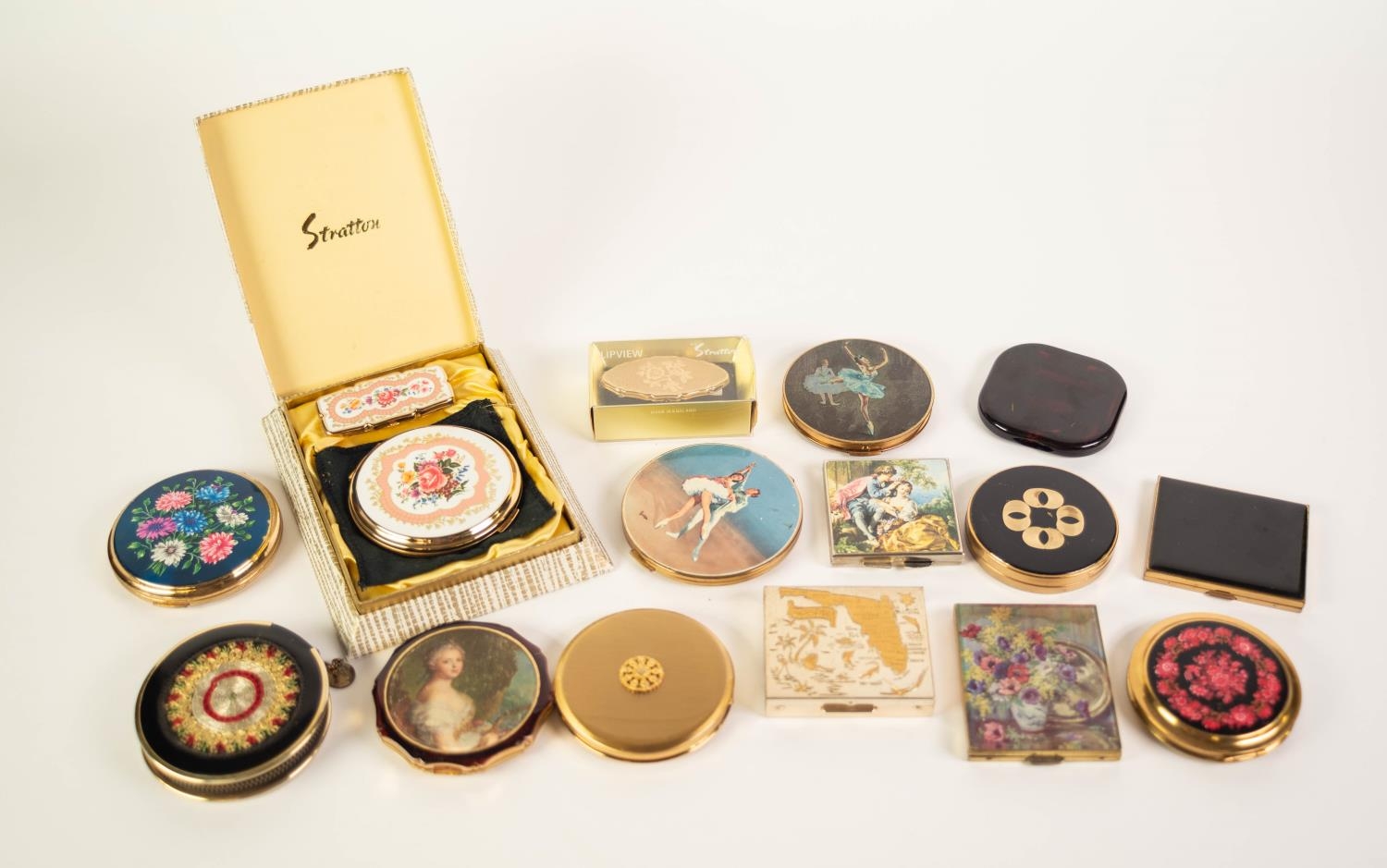 STRATTON BOXED POWDER COMPACT AND MATCHING LIPSTICK HOLDER, gilt metal and enamel effect, floral