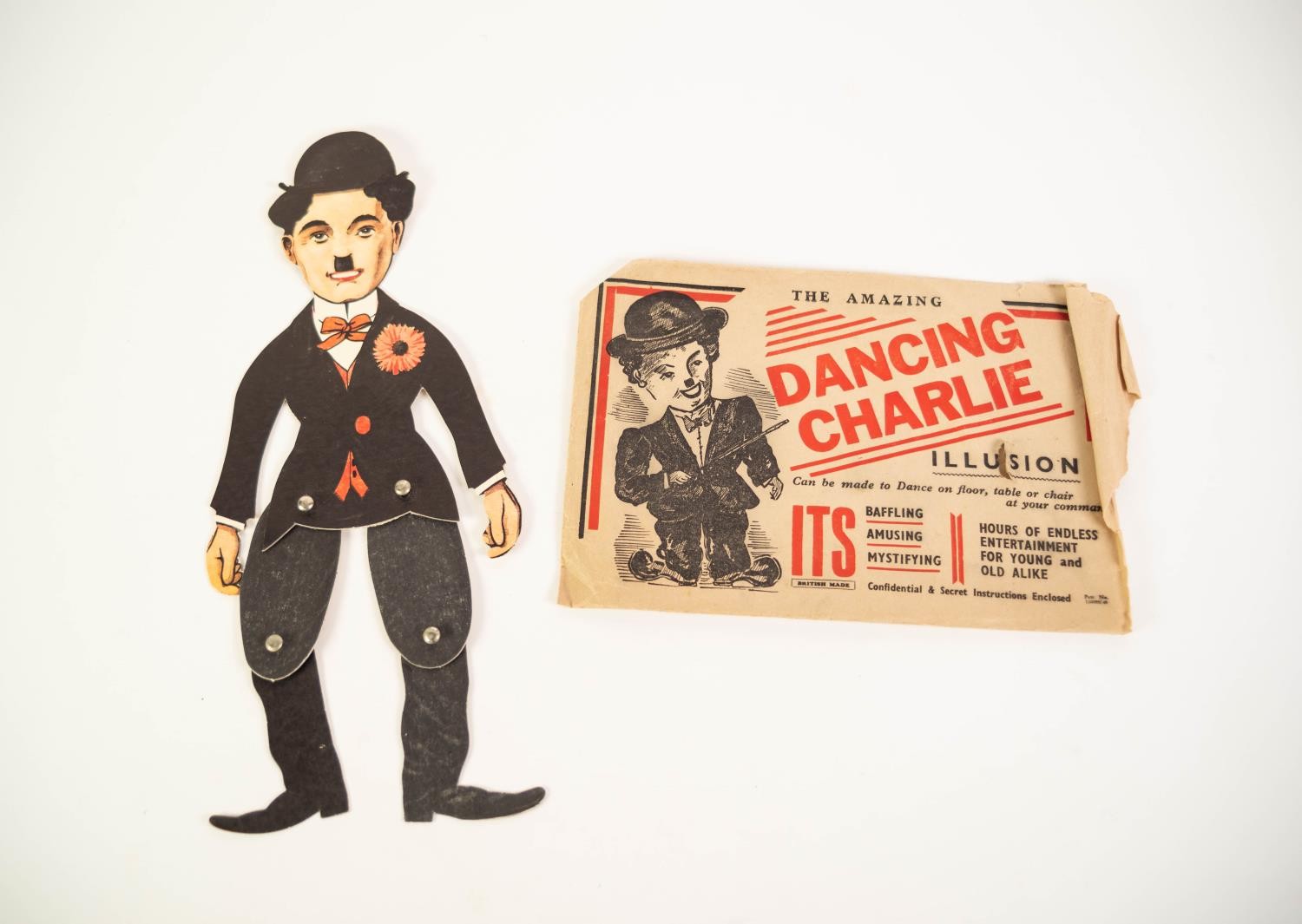 VINTAGE CIRCA 1930's 'THE AMAZING - DANCING CHARLIE' (CHAPLIN) ILLUSION DANCING FIGURE, colour