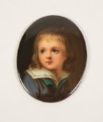 19TH CENTURY CONTINENTAL PORCELAIN OVAL PANEL PAINTED WITH A PORTRAIT MINIATURE of a young boy